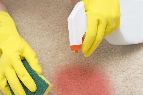 Professional oven cleaning service in a domestic kitchen