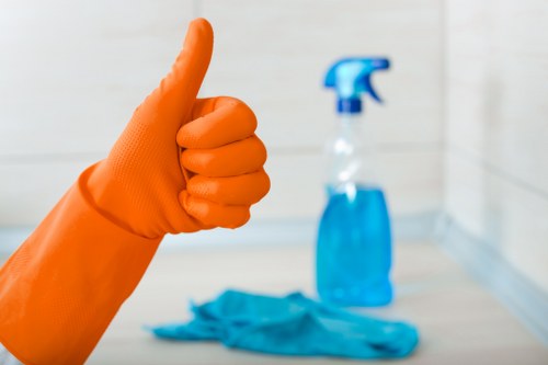 Local sofa cleaning technician working in a Merton property