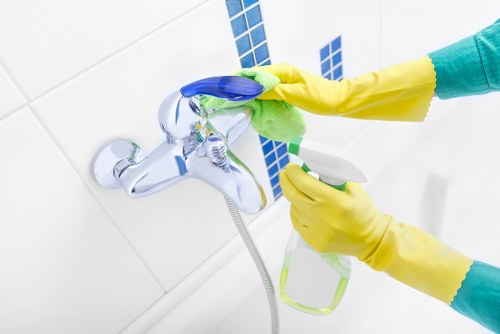 Notes being checked during an oven cleaning complaint process