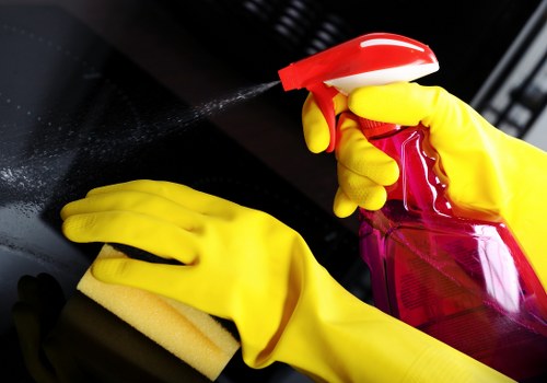 Professional cleaners servicing a workplace in Merton with flexible scheduling